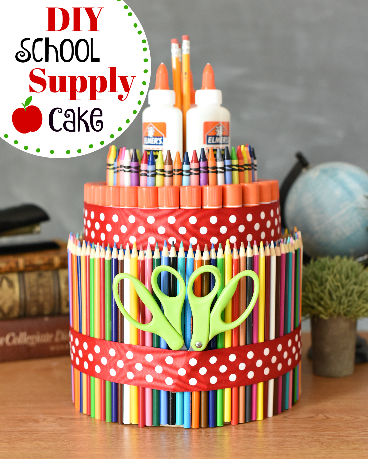 School Supply Cake. Such a fun way to make going back to school fun. So simple to put together, you'll want to make them for everyone. #backtoschool #schoolsupplies #funschoolsupplies #schoolsupplycake