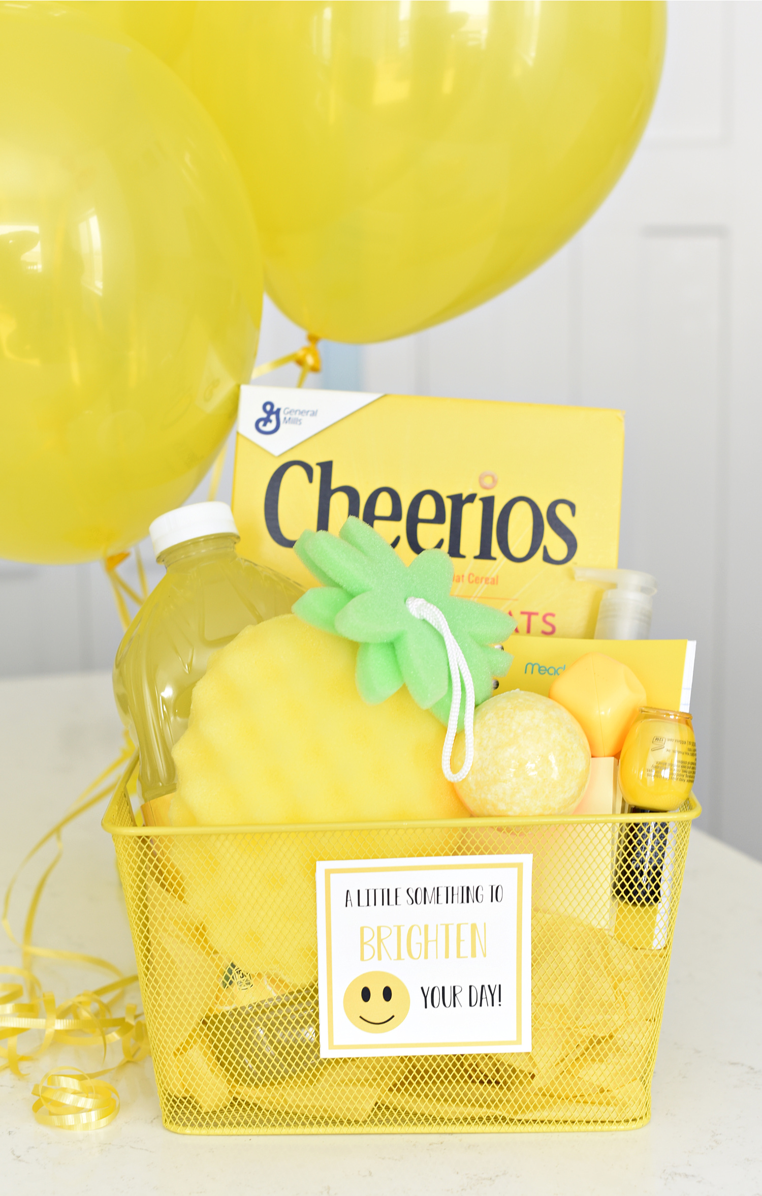 Cheer Up Gifts-This fun yellow themed gift basket is a great way to brighten someone's day! #gifts #giftideas #smile #cheerupgift #giftbaskets